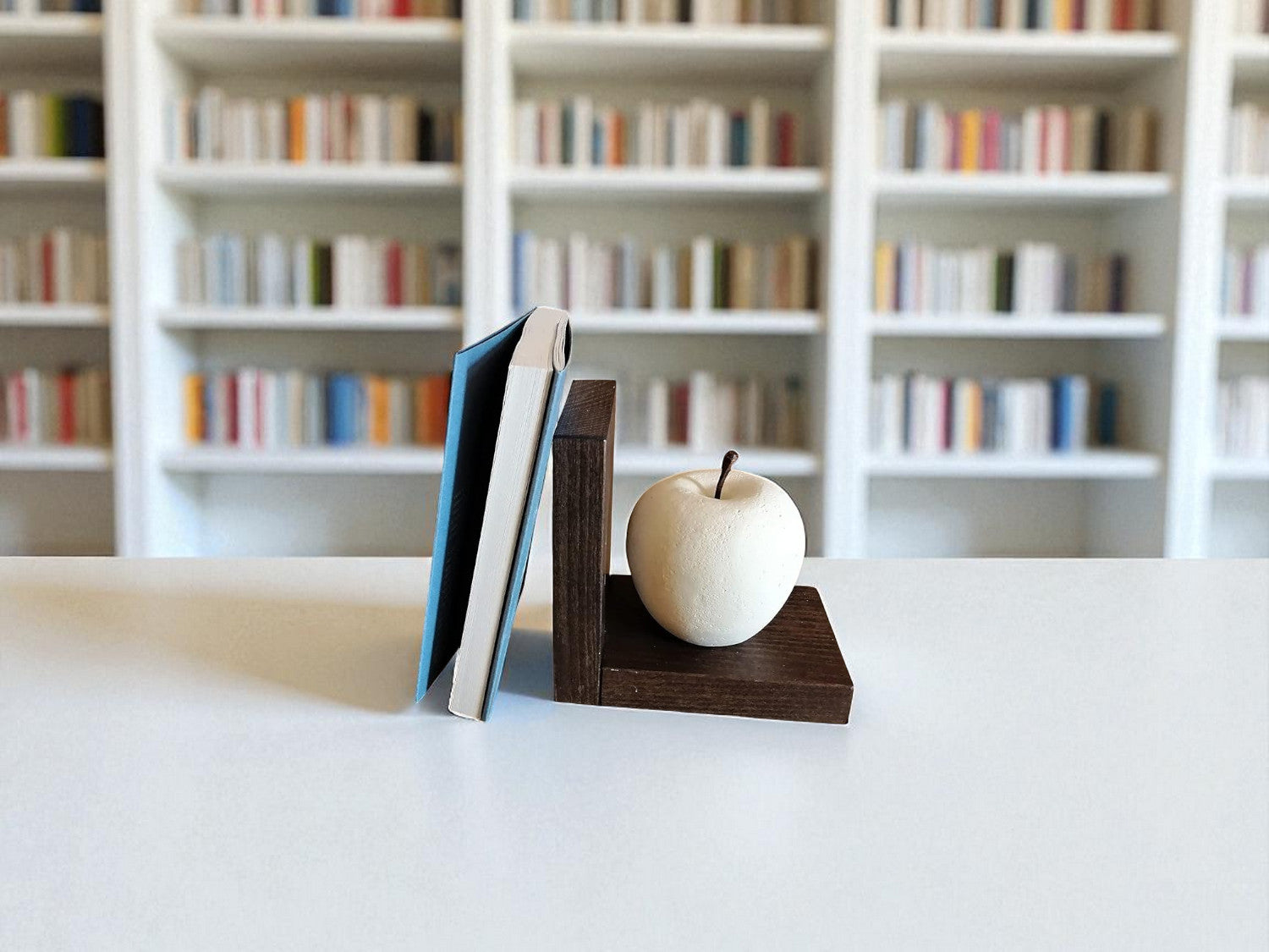Sujetalibros manzana